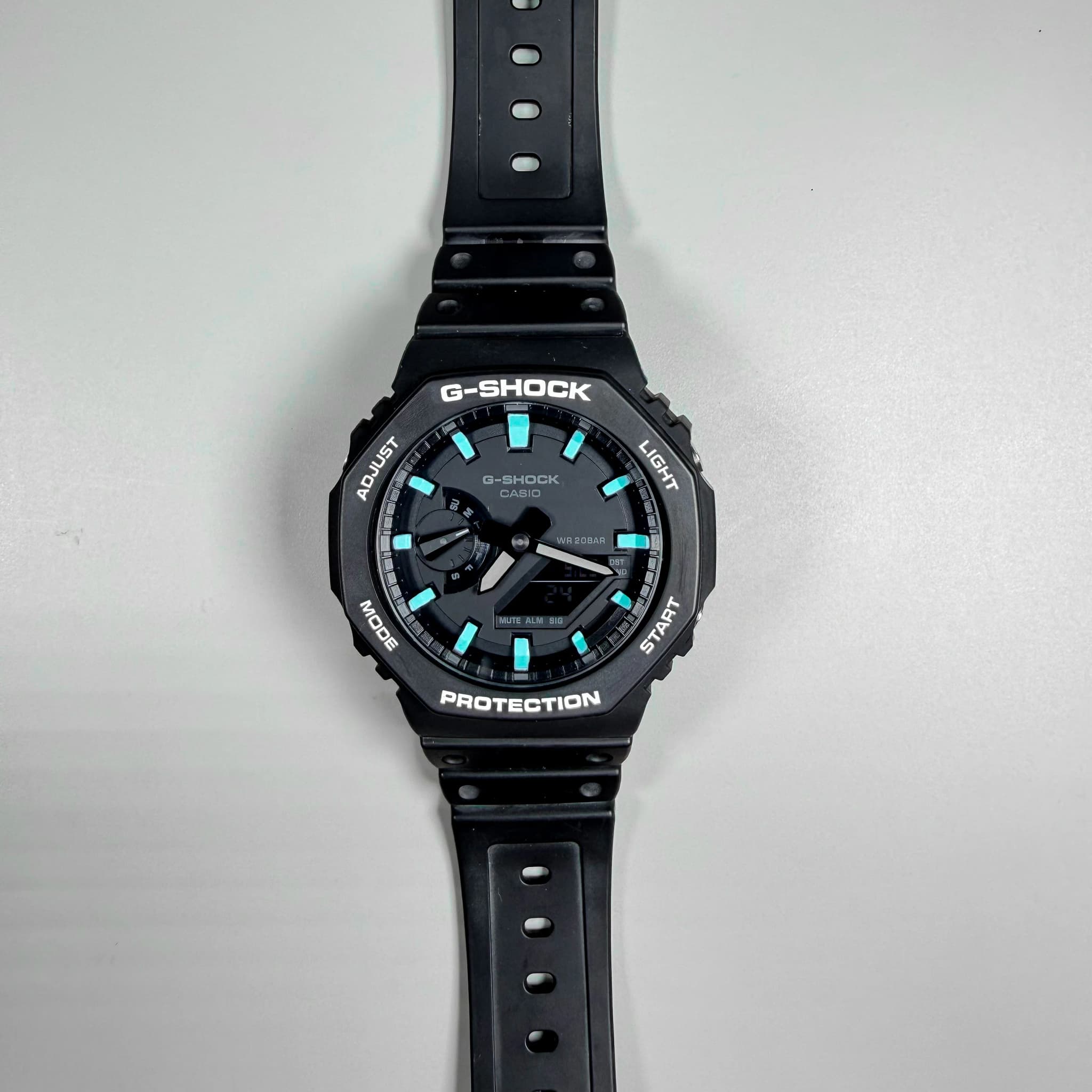 Aqua Tiffany-blue treatment on black G-Shock